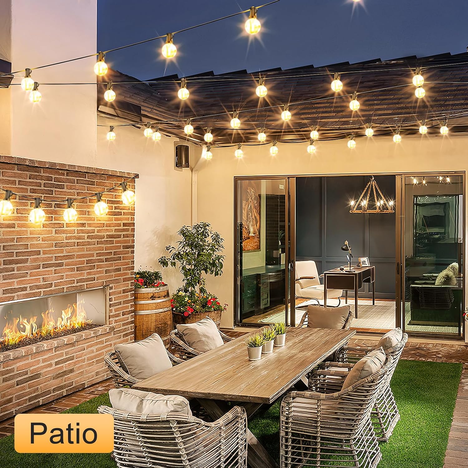 String lights decorating a modern backyard fence.

