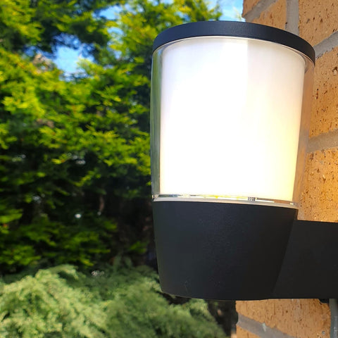 IP54 rated wall light installed on a brick wall

