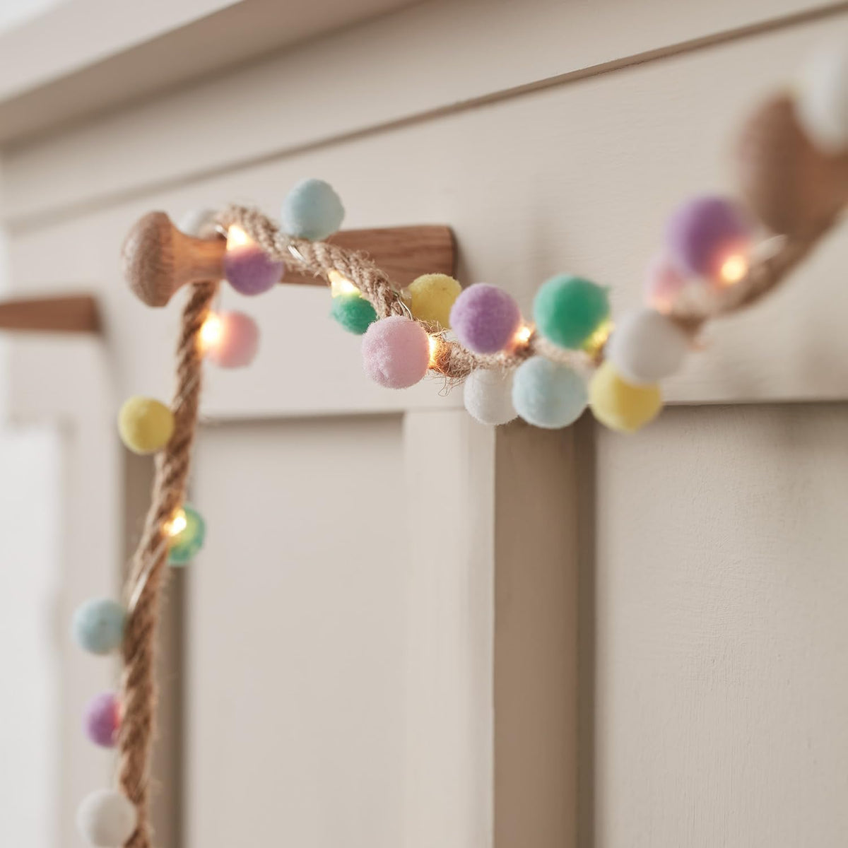 Pastel pom pom LED garland with warm white fairy lights, 1.4m