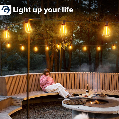 Person sitting on a wooden bench by a fire pit with string lights in a forest setting, featuring the text 'Light up your life'.