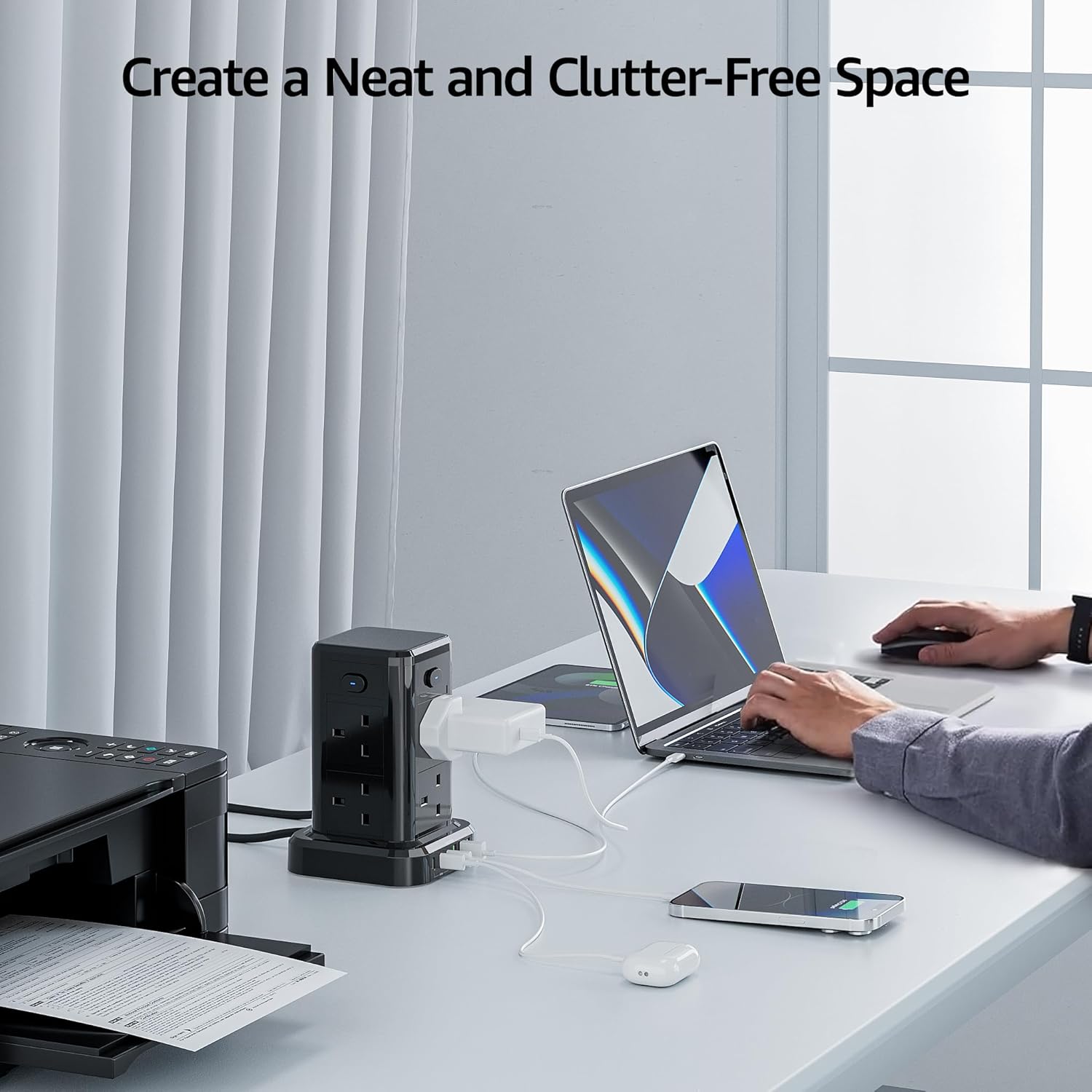 Person using a laptop at a desk with minimal clutter, text 'Create a Neat and Clutter-Free Space' above.