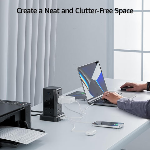Person using a laptop at a desk with minimal clutter, text 'Create a Neat and Clutter-Free Space' above.