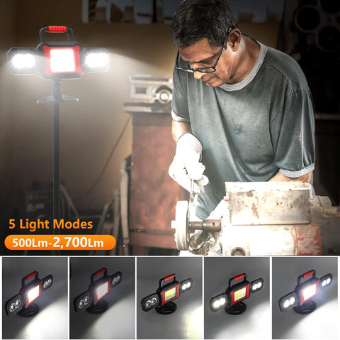 Person working on machinery with a portable work light showing different light modes.
