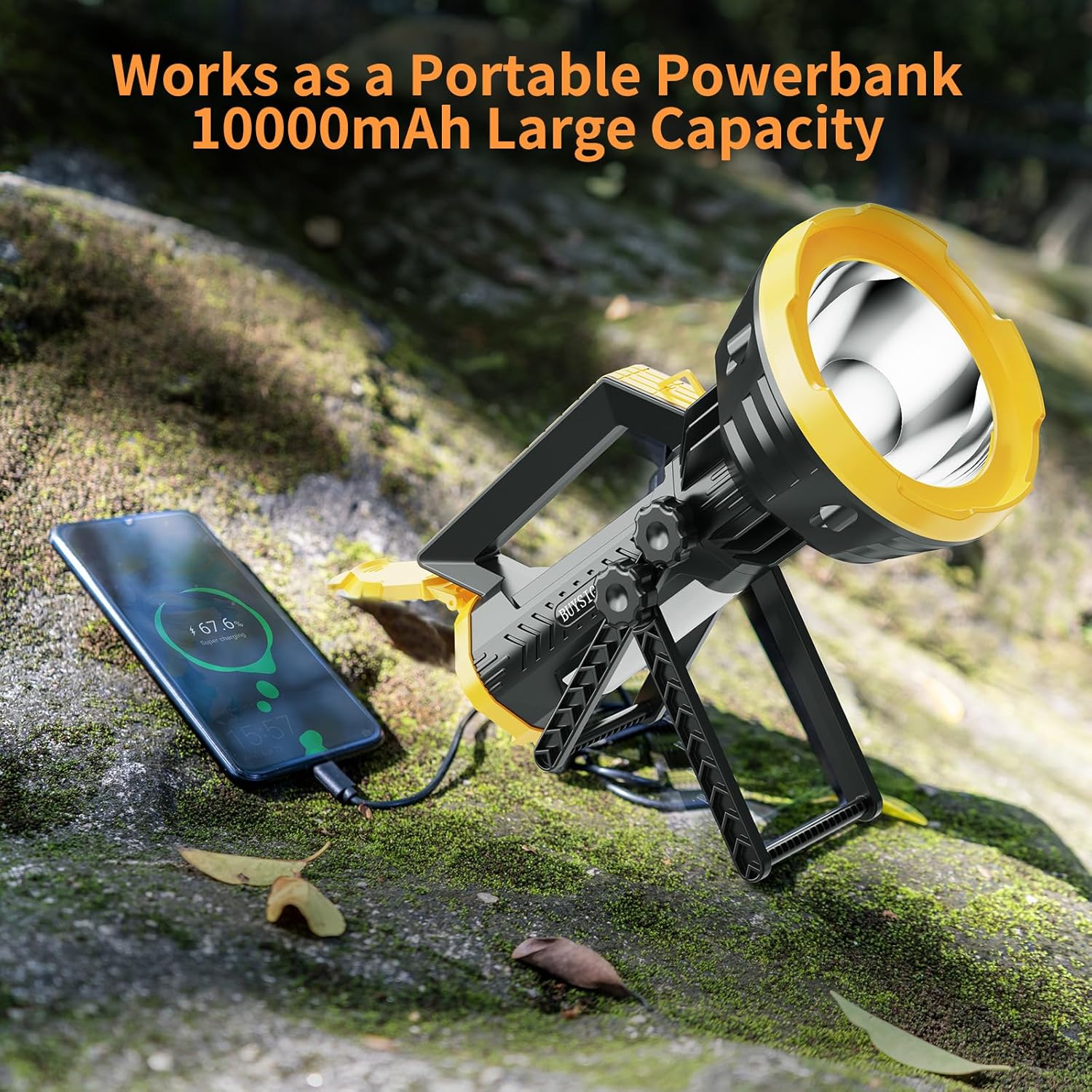 Portable power bank with flashlight charging a smartphone on a natural background