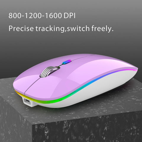 Purple and white computer mouse on a dark surface with text about DPI settings.