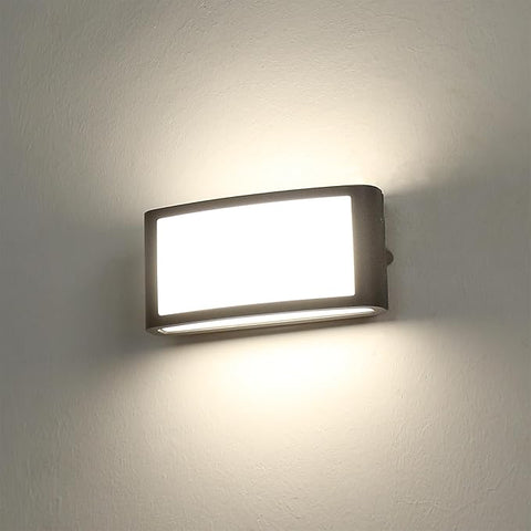 Rectangular wall light fixture on a plain wall