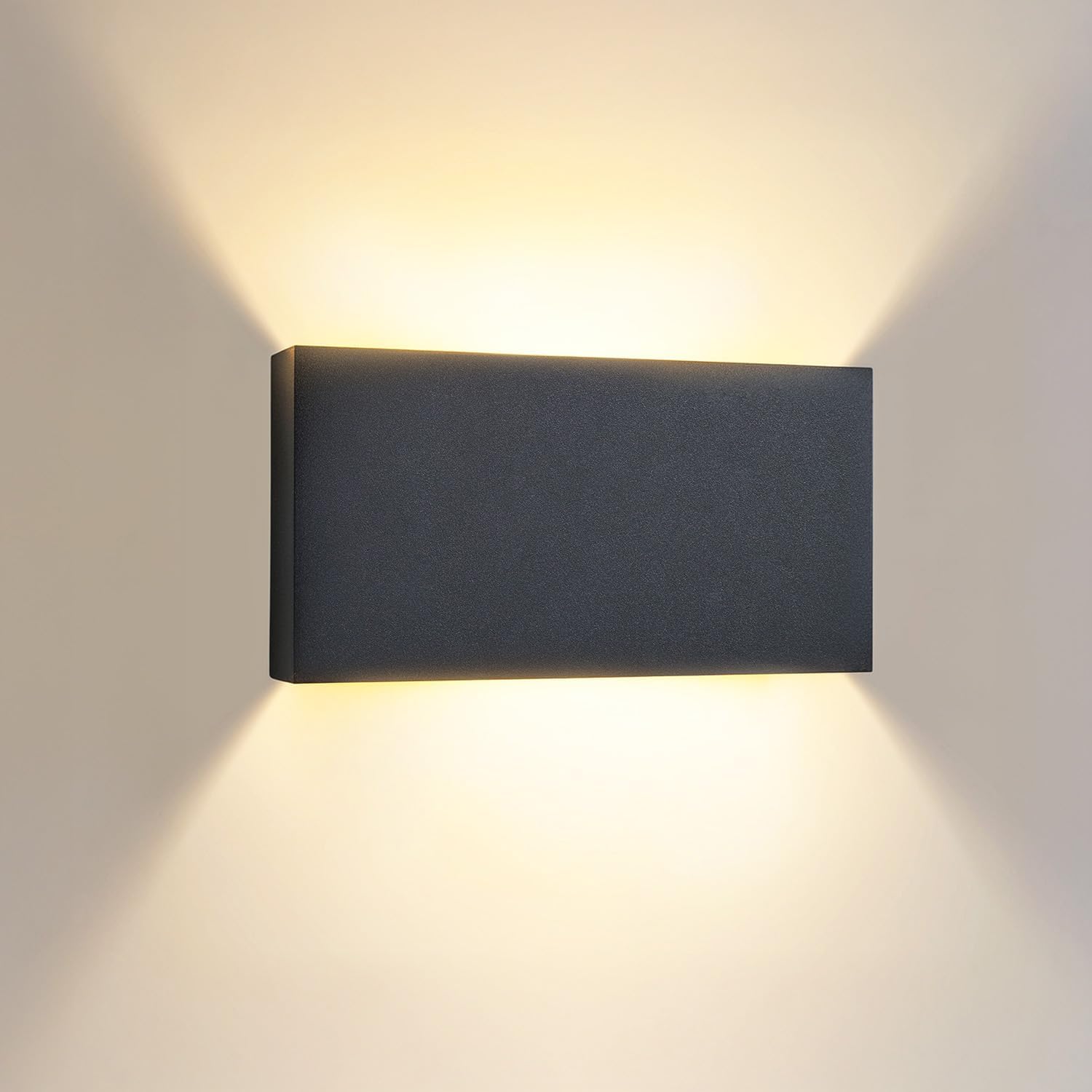 Rectangular wall light fixture on a plain wall
