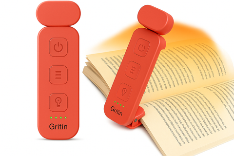 Red Gritin book light on an open book with control buttons.