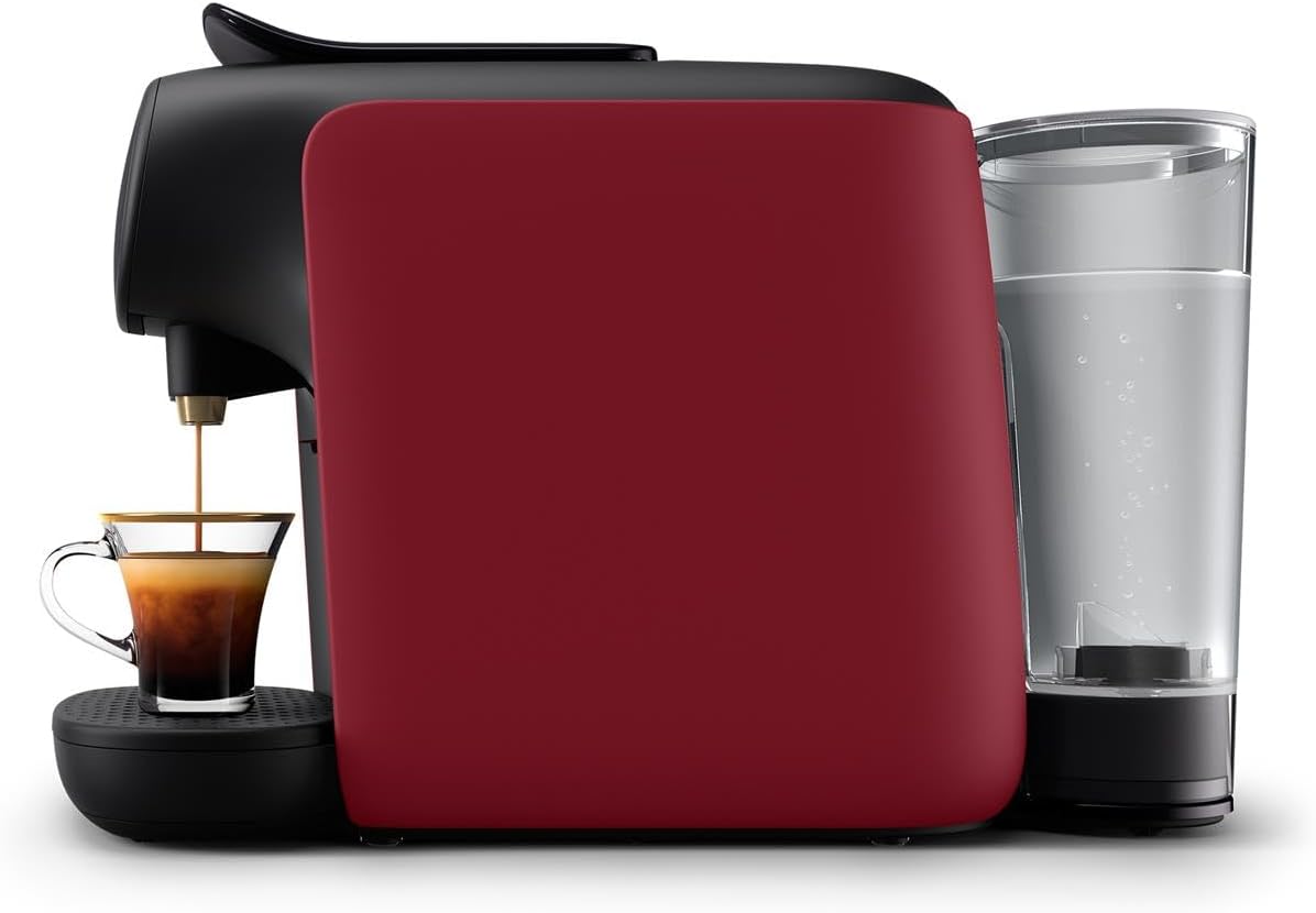 Red coffee machine with a glass of water and a cup of coffee on a white background