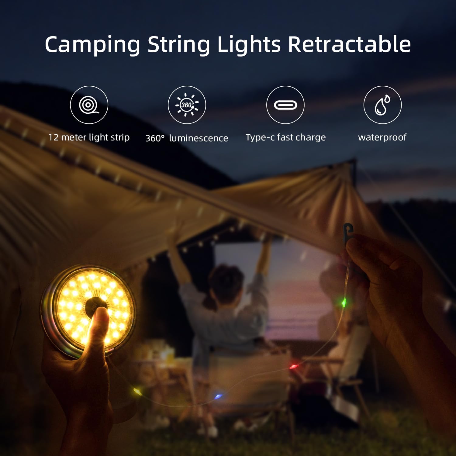 Retractable camping string lights being used at a campsite with a couple watching a movie on a screen.