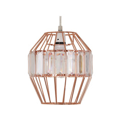Cage-style lamp shade above a rustic dining table

