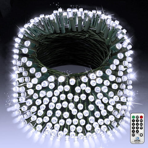 Roll of LED string lights with remote control on a dark background