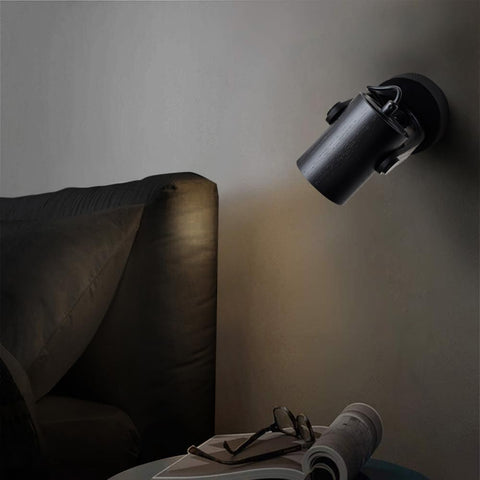 Rotatable bedside wall lamp

