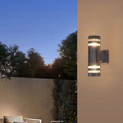Modern outdoor garden sconce providing ambient light in an outdoor patio

