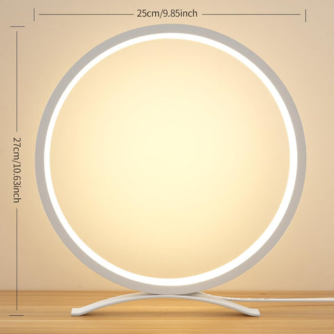 Round table lamp with dimensions on a wooden surface