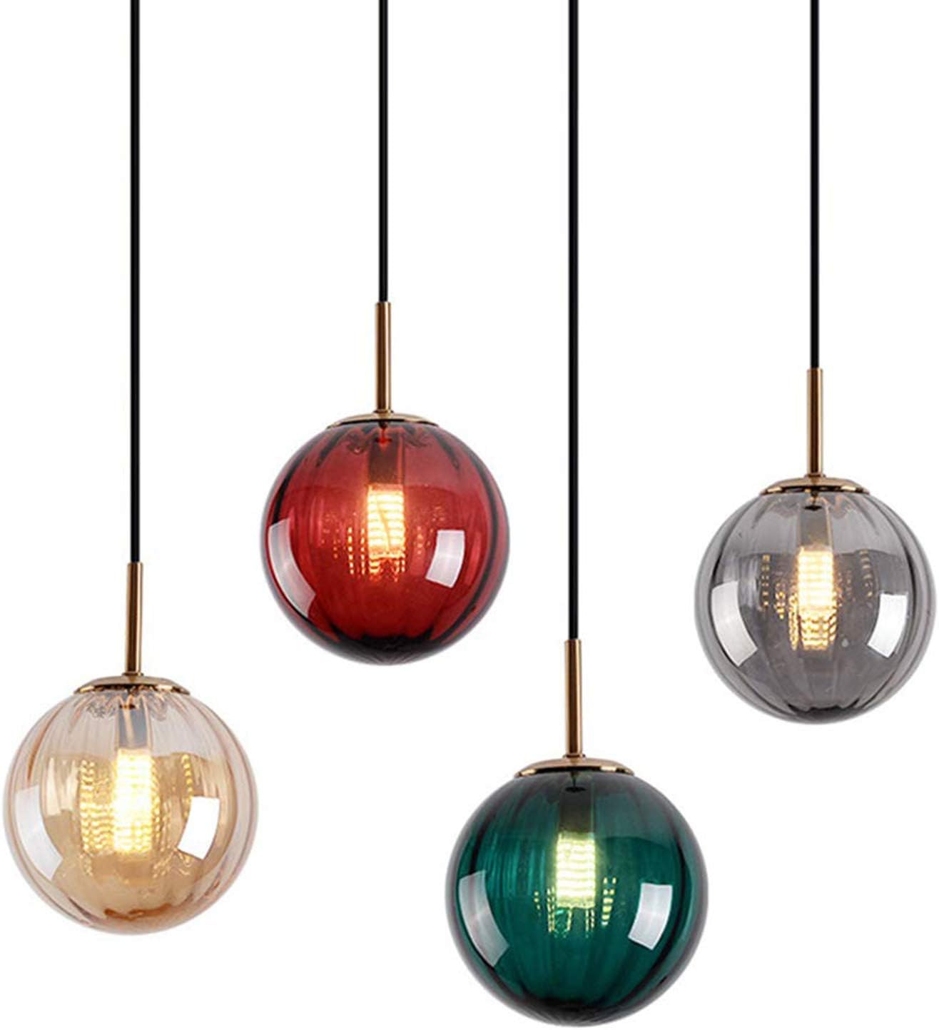Set of colorful glass pendant lights on a white background