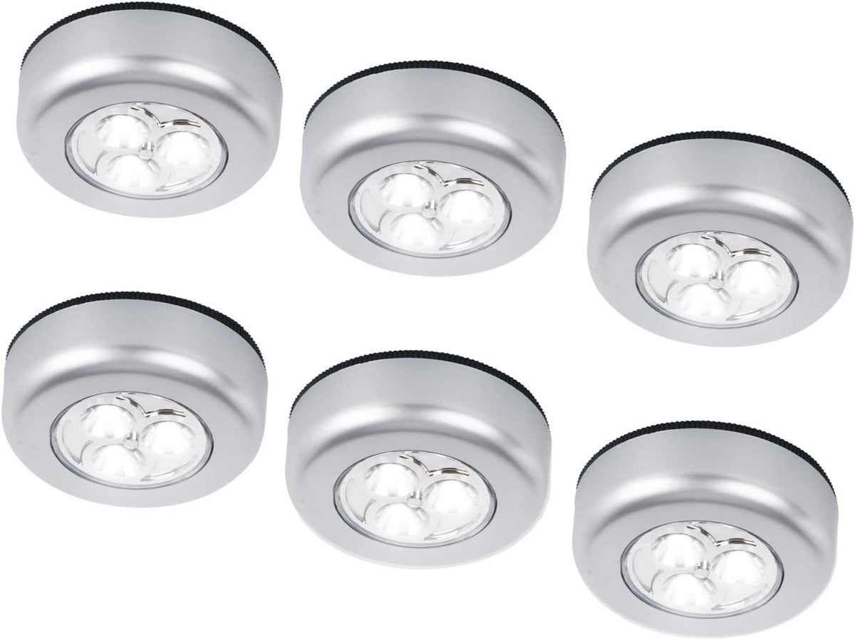 Set of six round silver LED lights on a white background