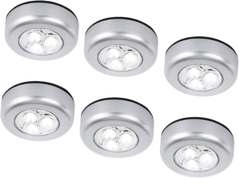 Set of six round silver LED lights on a white background