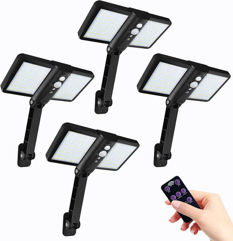 Set of six solar flood lights with a remote control on a white background