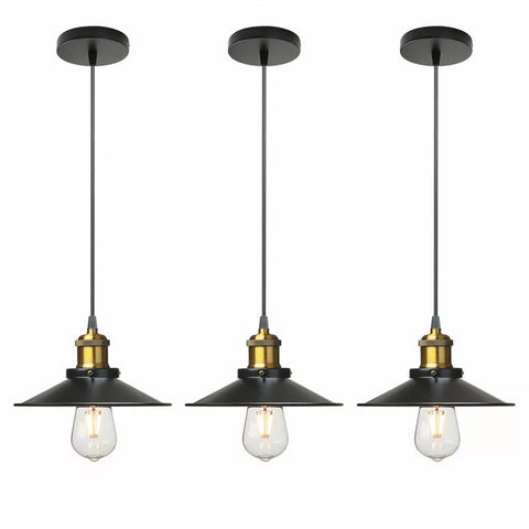 Modern chandelier light retro-style hanging above dining table

