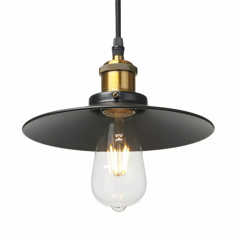 Close-up of antique brass pendant light shade and fitting

