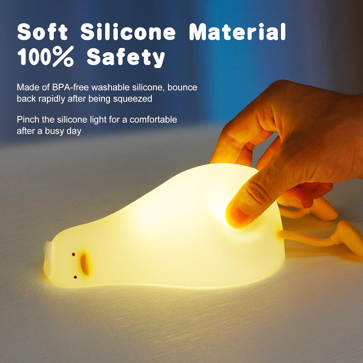Silicone night light being squeezed by a hand with safety information text.