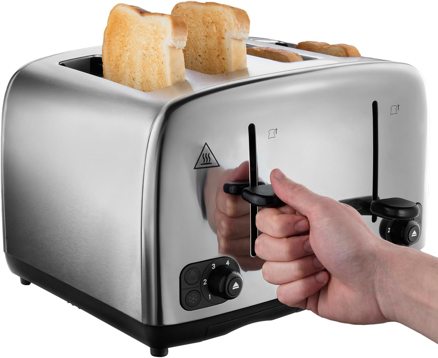 Silver toaster with slices of bread being inserted, hand holding the lever.