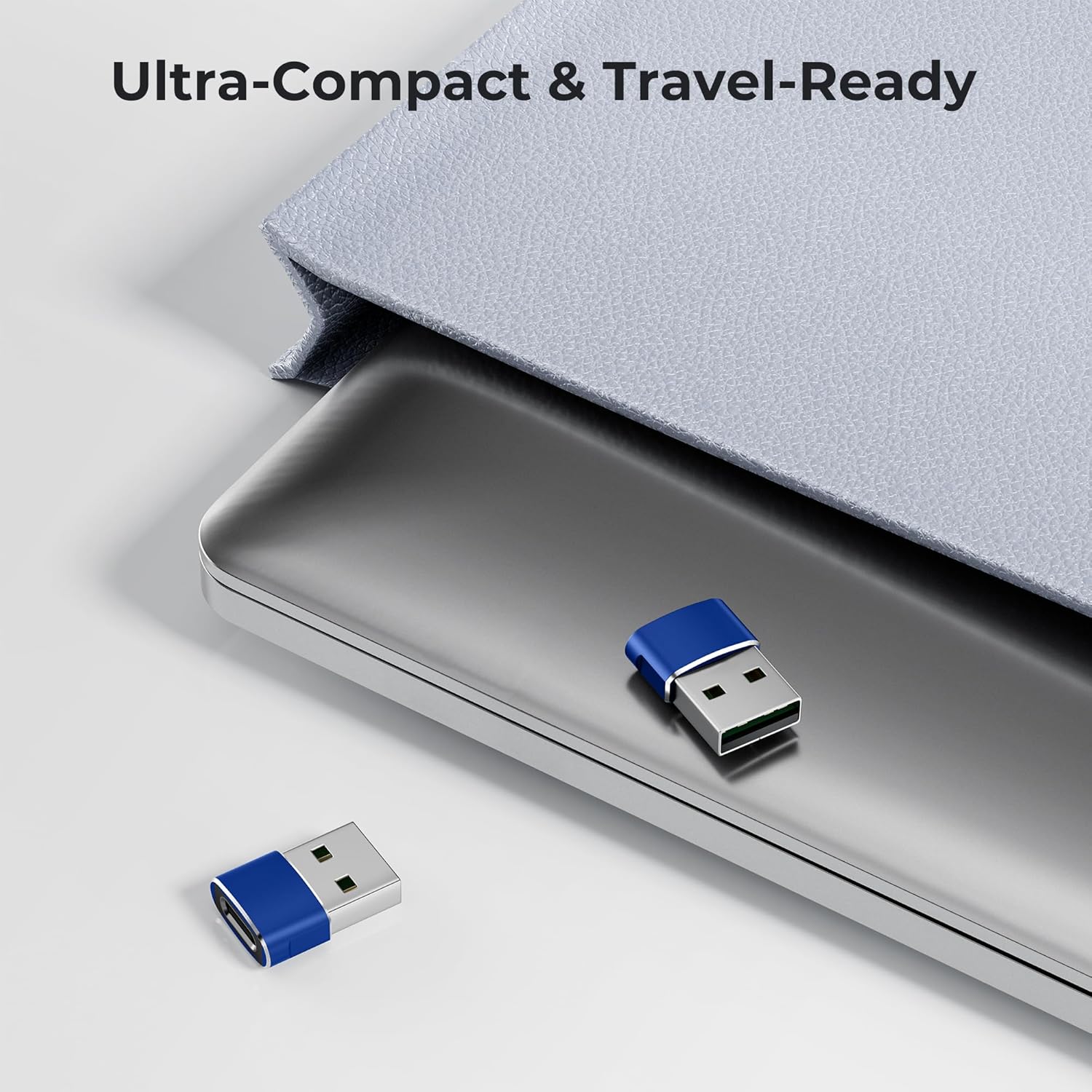 Small blue USB device on a metallic surface with text 'Ultra-Compact & Travel-Ready'.
