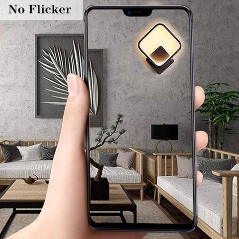 Smartphone displaying a living room scene with 'No Flicker' text above.