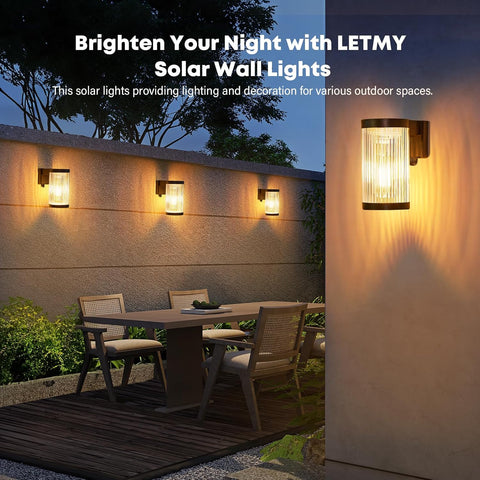 Solar wall lights on a wall with outdoor setting and dining table.