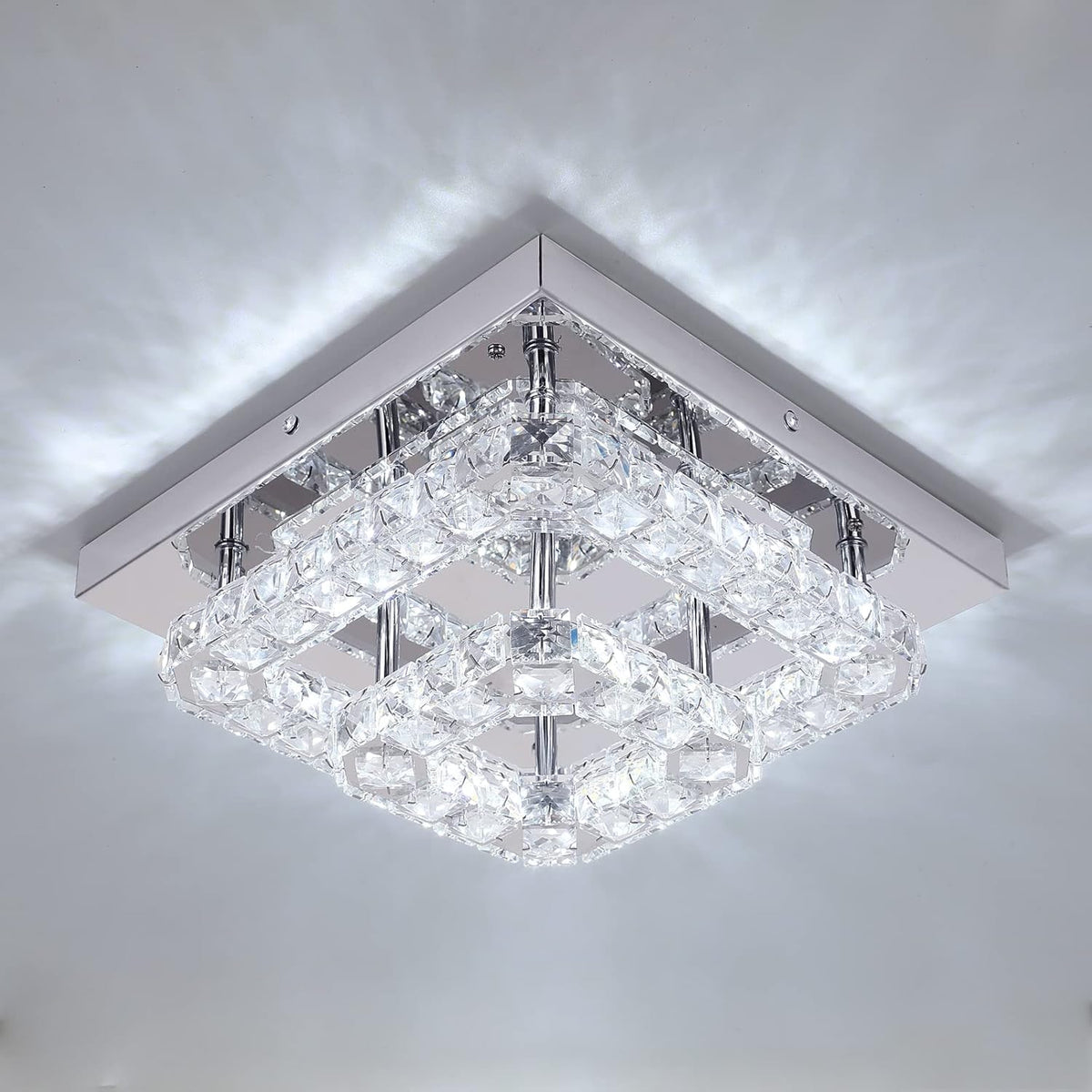 Square crystal ceiling light fixture on a white ceiling