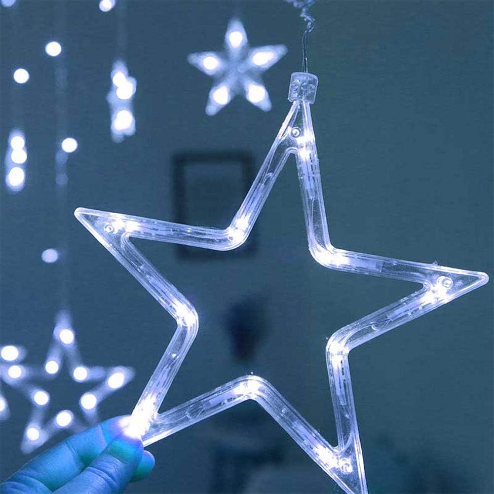 Star-shaped LED string light held by a hand against a dark background
