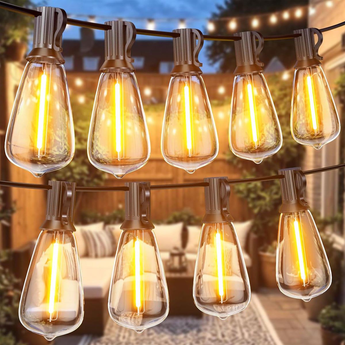String of illuminated outdoor lights in a backyard setting