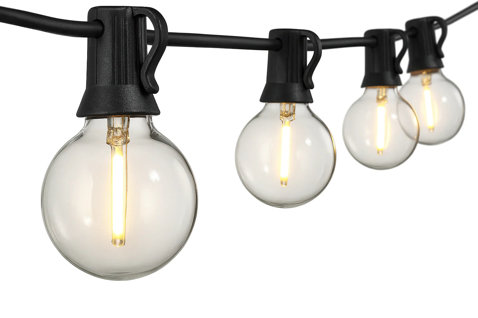String of light bulbs on a black cord against a white background