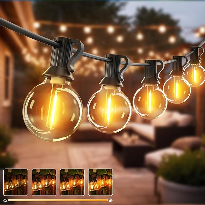 String of outdoor lights with glowing bulbs in a garden setting