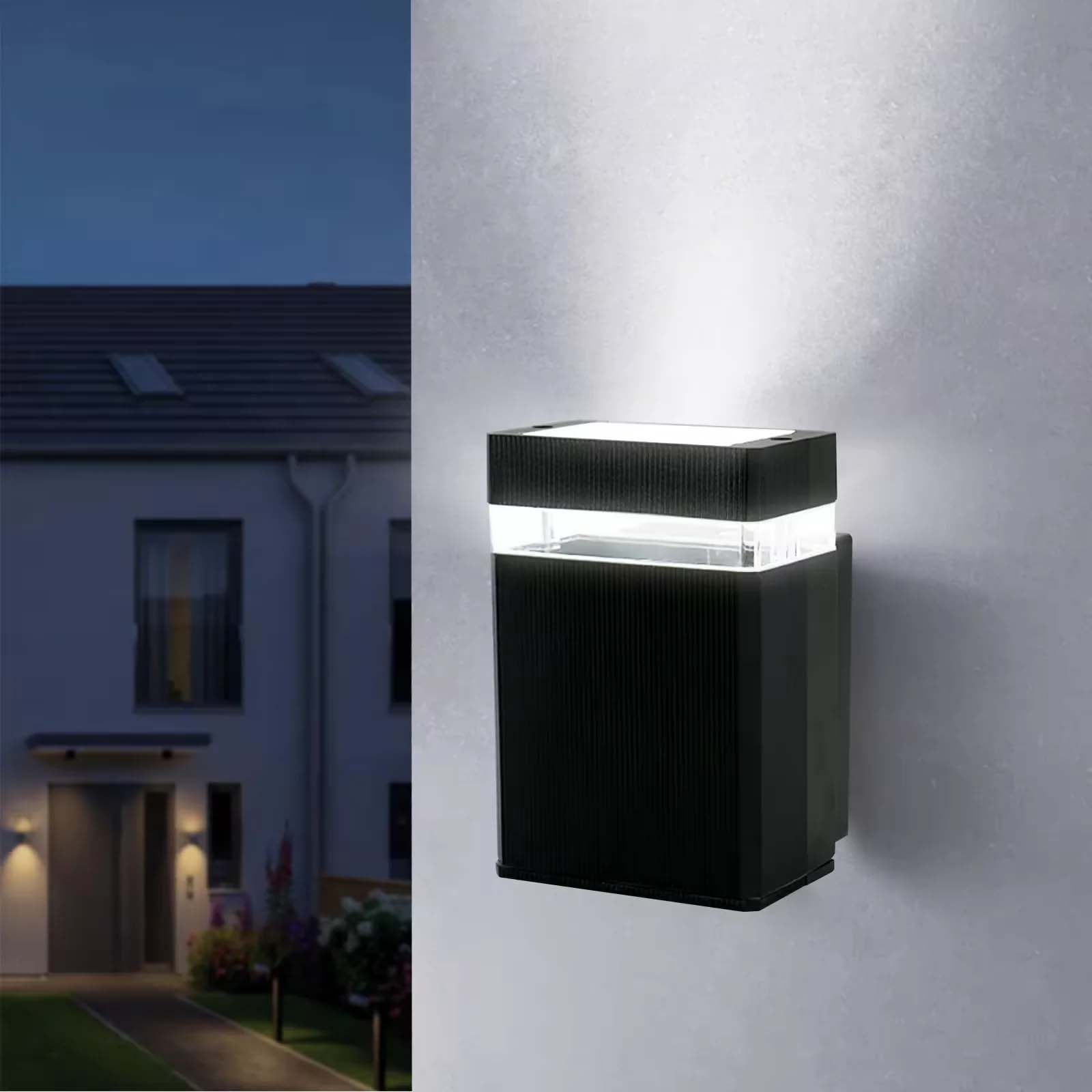 Black finish wall sconce mounted on a porch entrance

