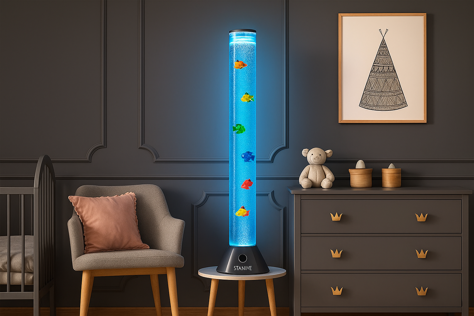 Tall cylindrical lamp with colorful fish inside, placed on a small round table in a room with dark walls, a gray chair, and a dresser.