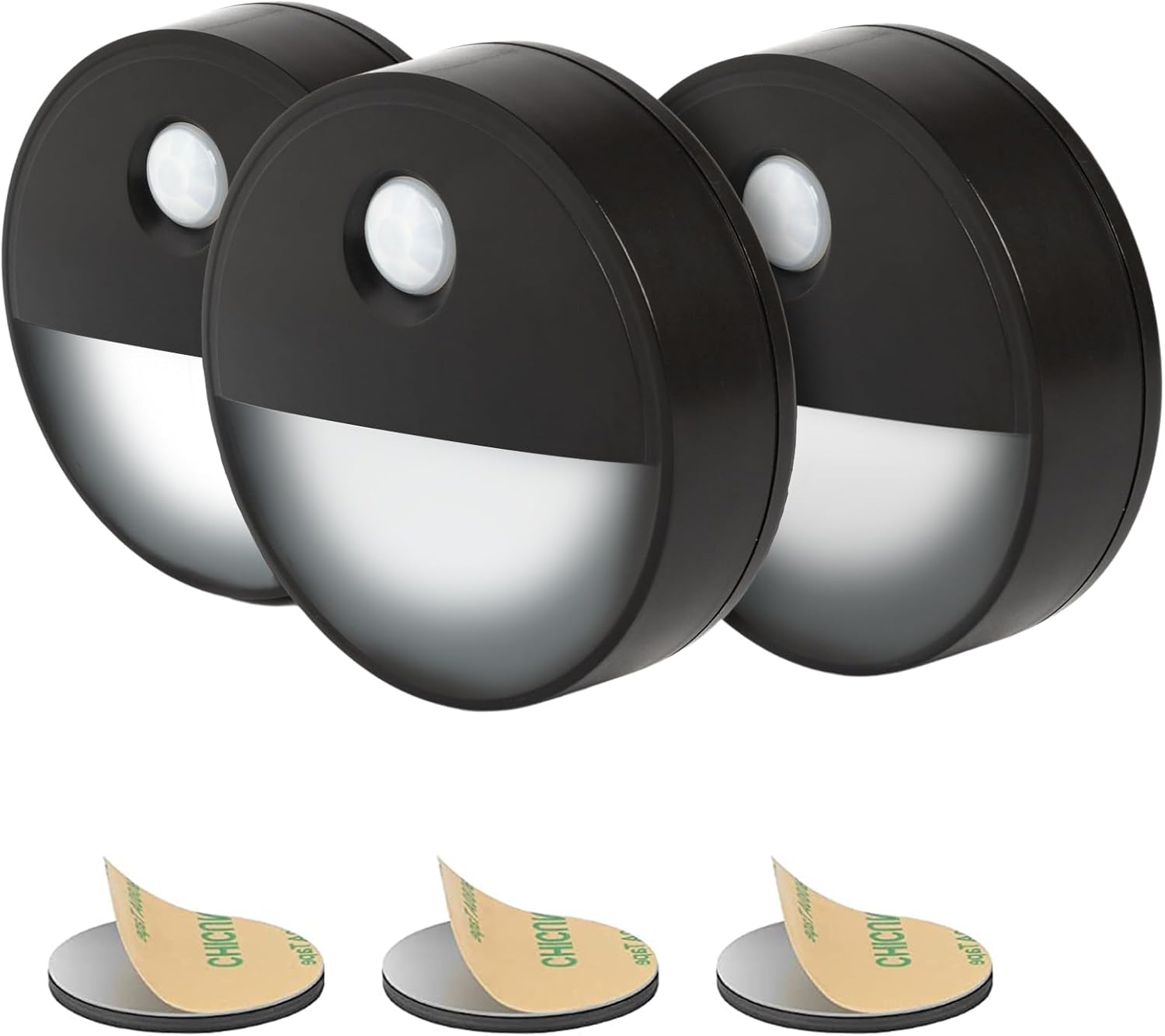 Three black motion sensor lights with adhesive pads on a white background