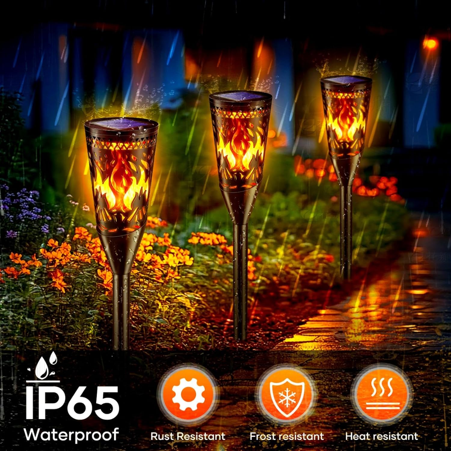 Three flame-patterned outdoor lights on a wet pavement with IP65, rust resistant, frost resistant, and heat resistant icons displayed.