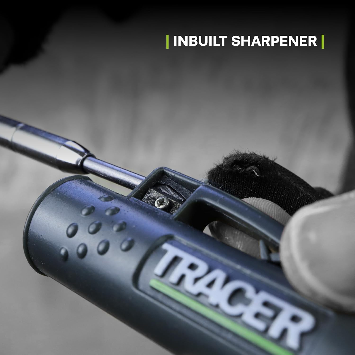 Tracer knife with built-in sharpener on a blurred background