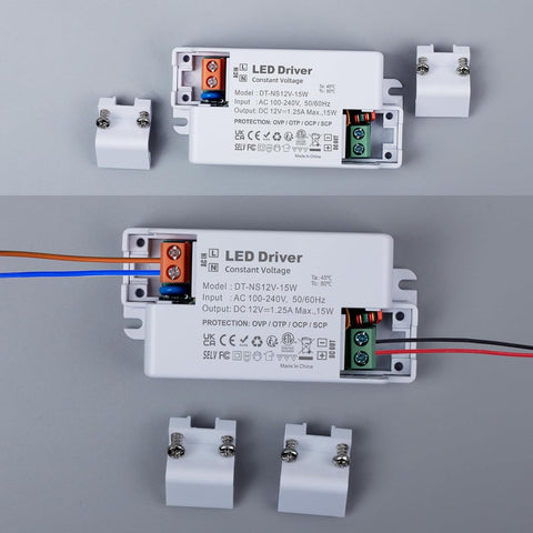 Two LED driver power supplies with connectors on a gray background