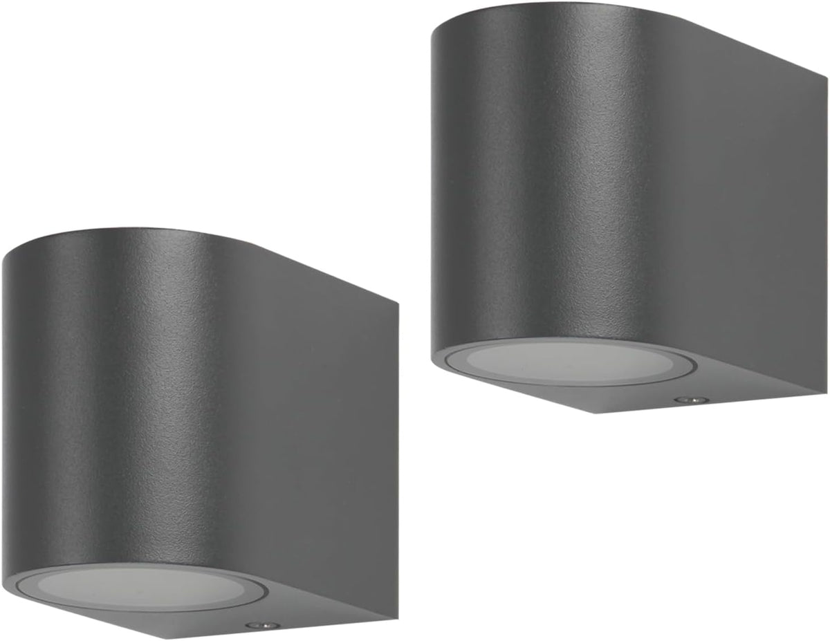 Two gray cylindrical wall lights on a white background