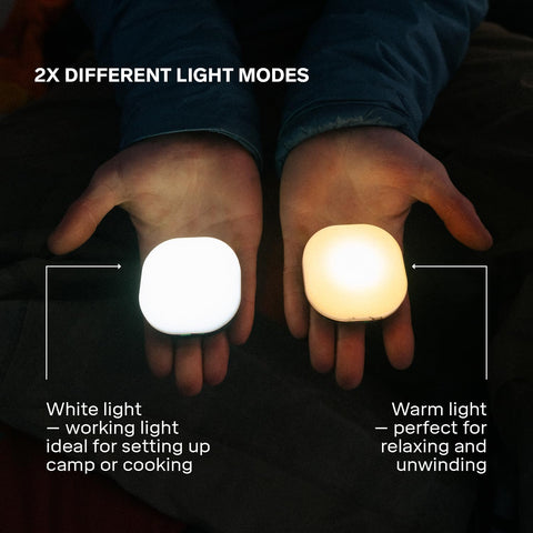 Two hands holding a white light and a warm light source with text explaining different light modes.