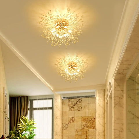 Two modern ceiling lights in a room with decorative elements.