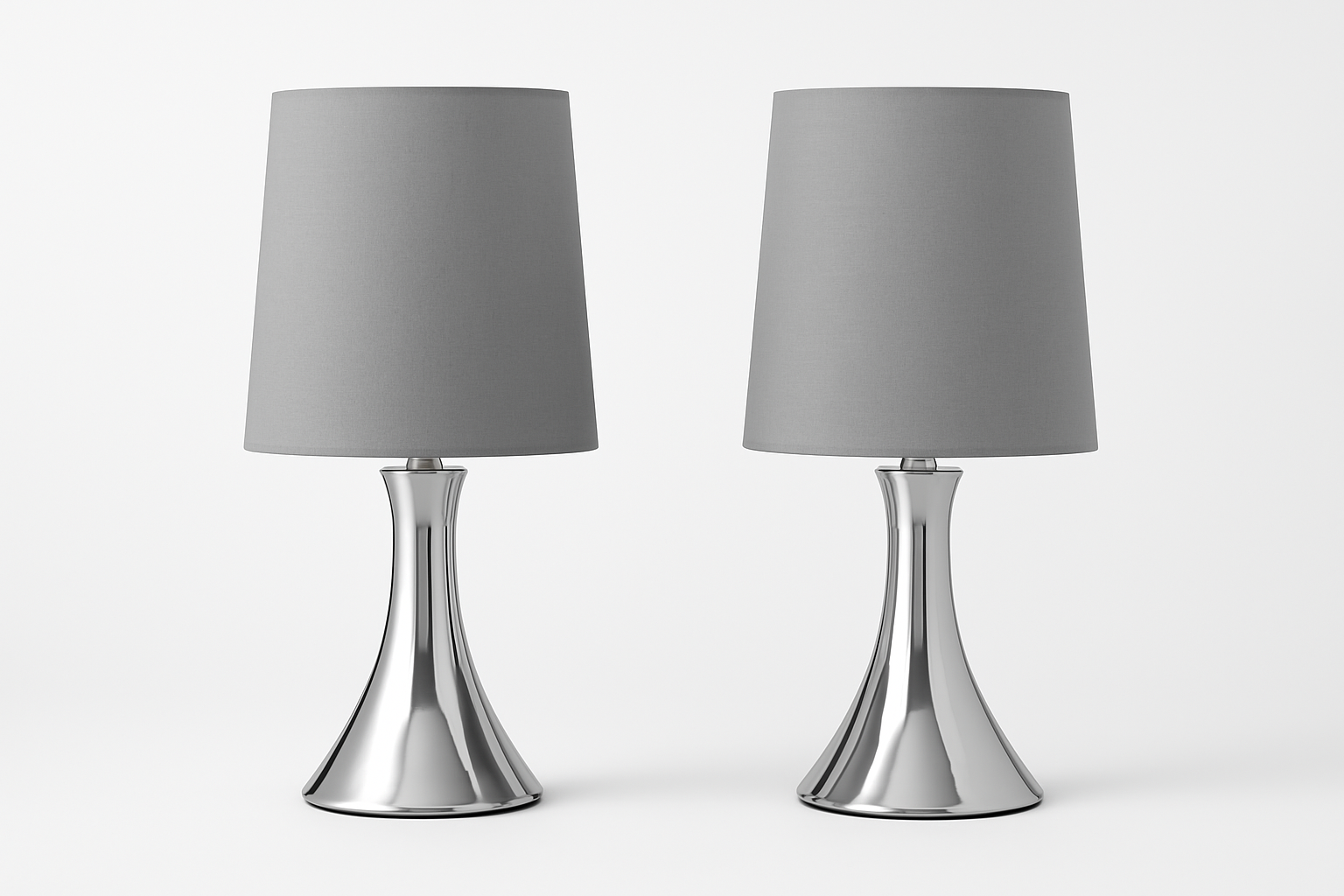 Two table lamps with gray shades and silver bases on a white background