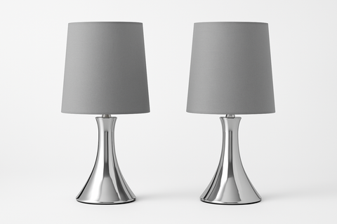 Two table lamps with gray shades and silver bases on a white background