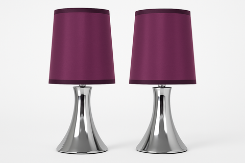 Two table lamps with purple shades and silver bases on a white background