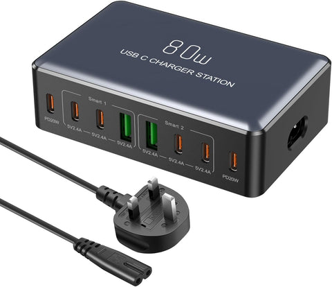 USB C charger station with multiple ports and a power cord on a white background