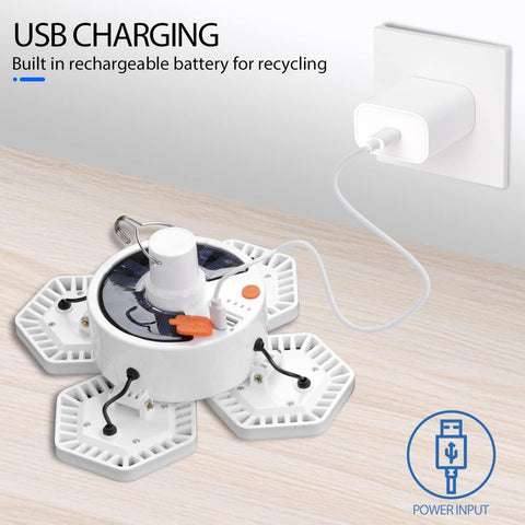 USB charging station with rechargeable battery on a wooden surface