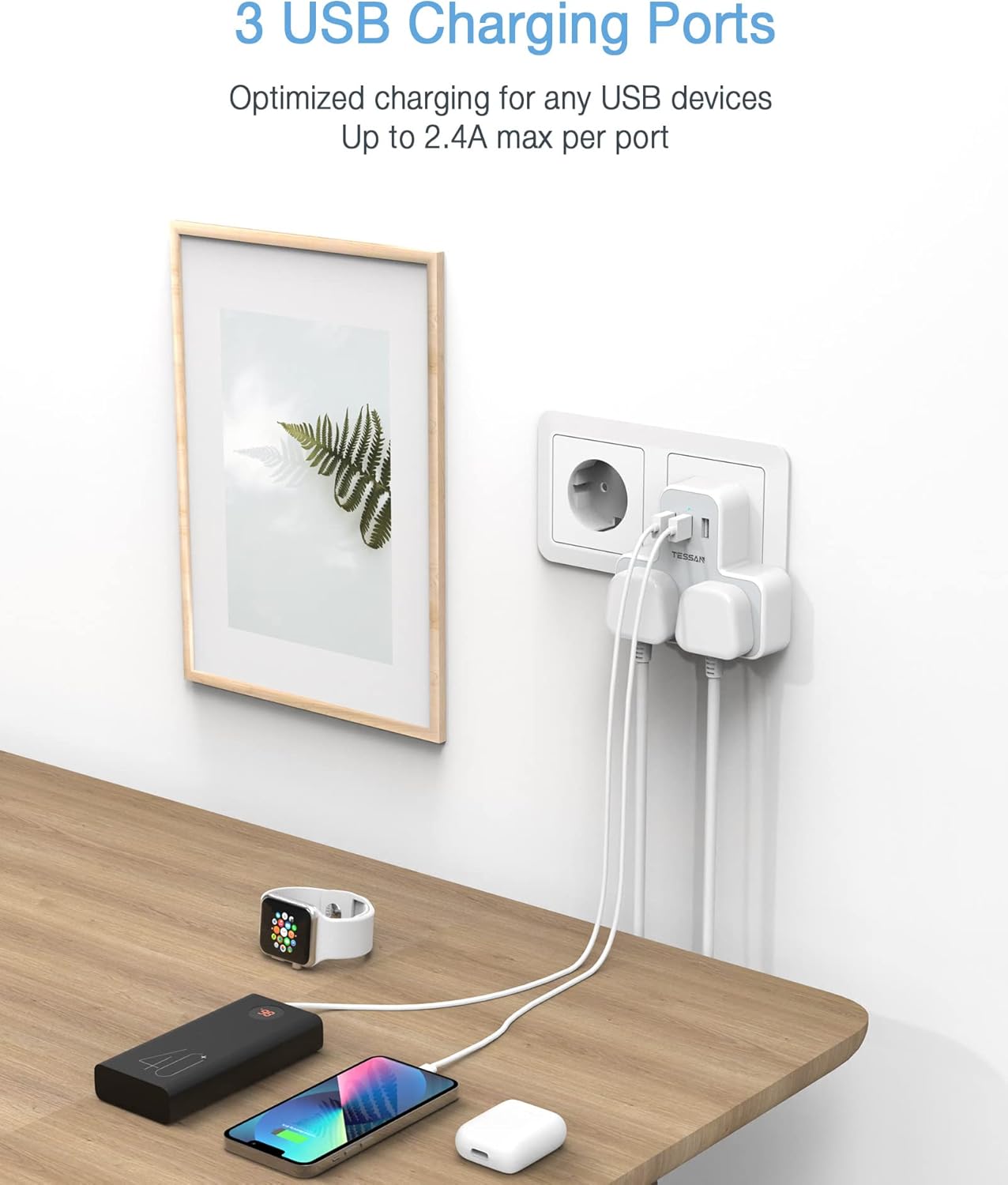 USB charging station with three ports on a wooden desk, featuring a smartphone, smartwatch, and power bank.